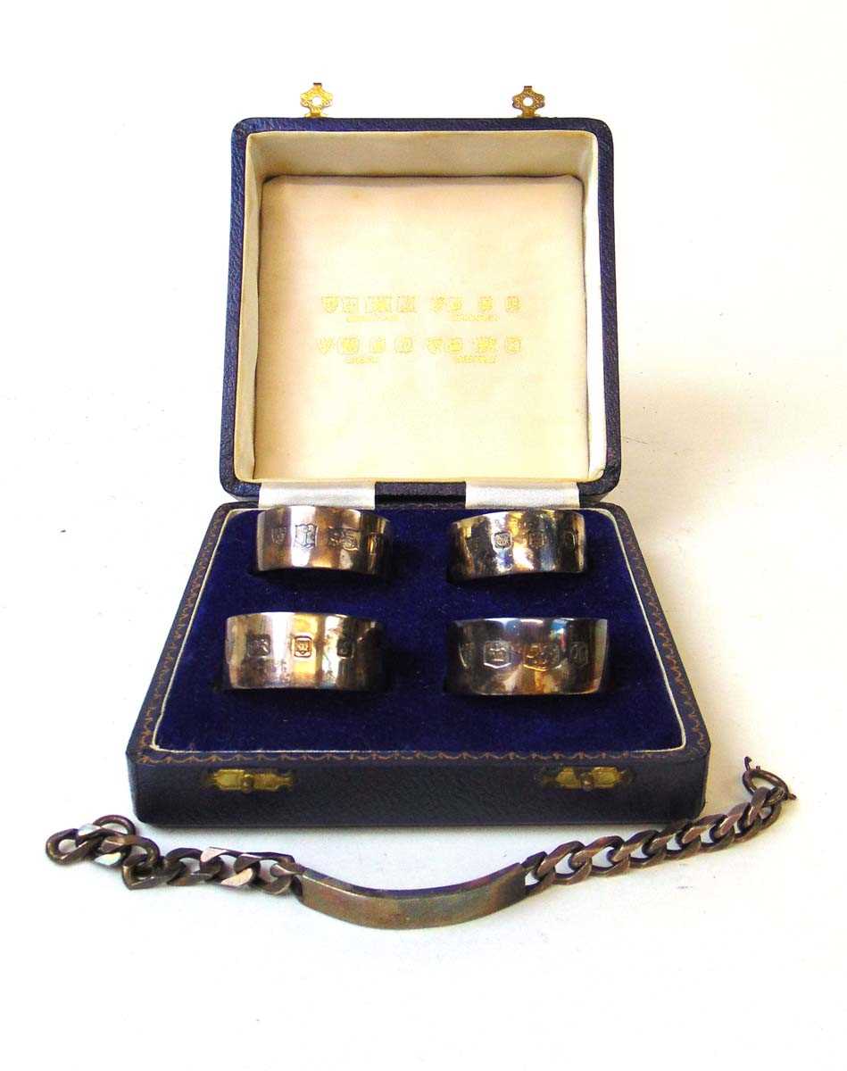 A set of four silver napkin rings, J B Chatterley & Sons, assay marks for Birmingham, Edinburgh, - Image 2 of 2