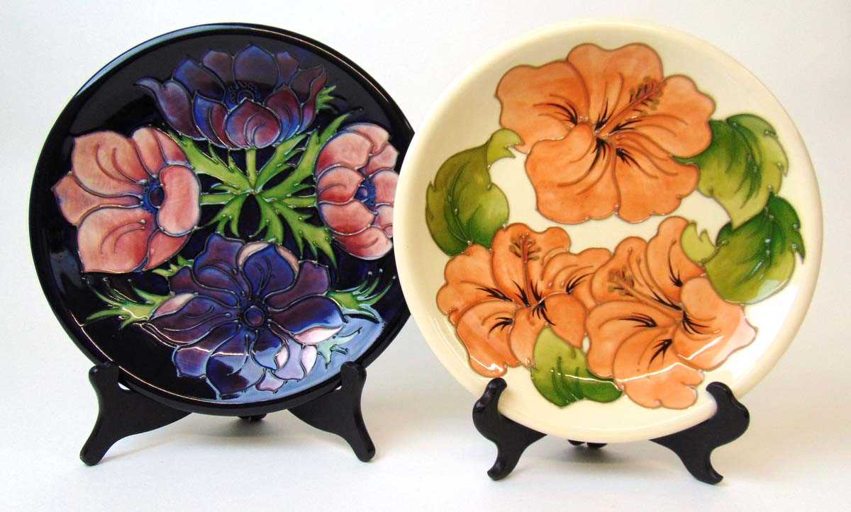 Two Moorcroft plates, in Hibiscus and Anemone patterns, late 20th century, 26cm diameter;