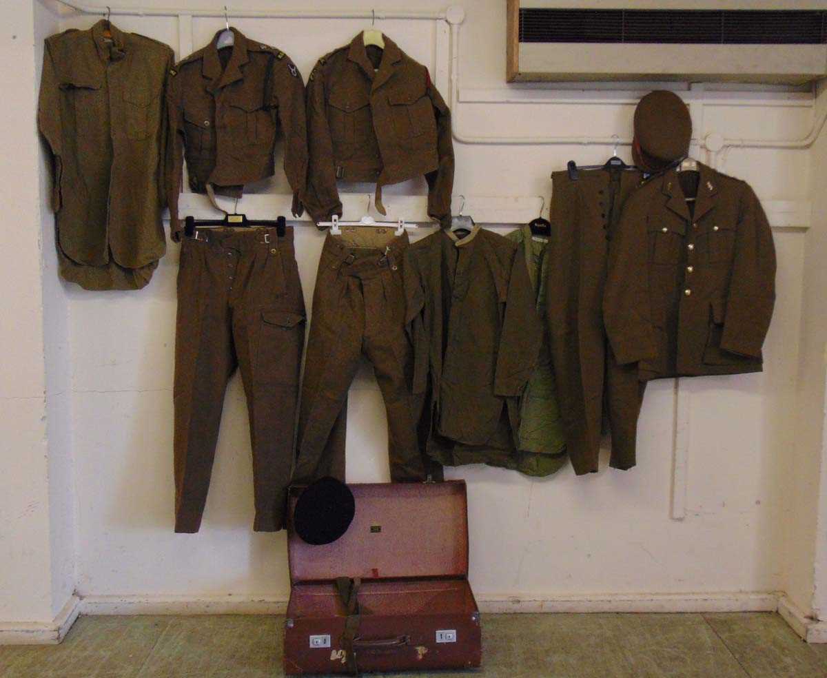 British Army battledress with insignia and patches, formerly the property of Lieutenant O.B.