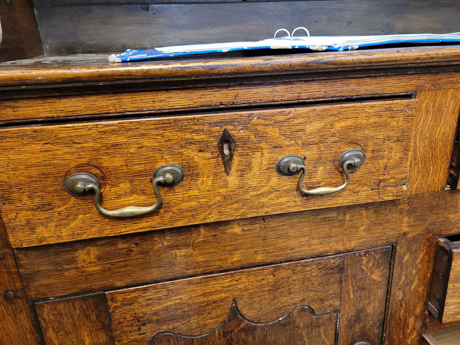 A George III oak Welsh dresser, with cavetto moulded pediment above the boarded back with three - Image 6 of 39