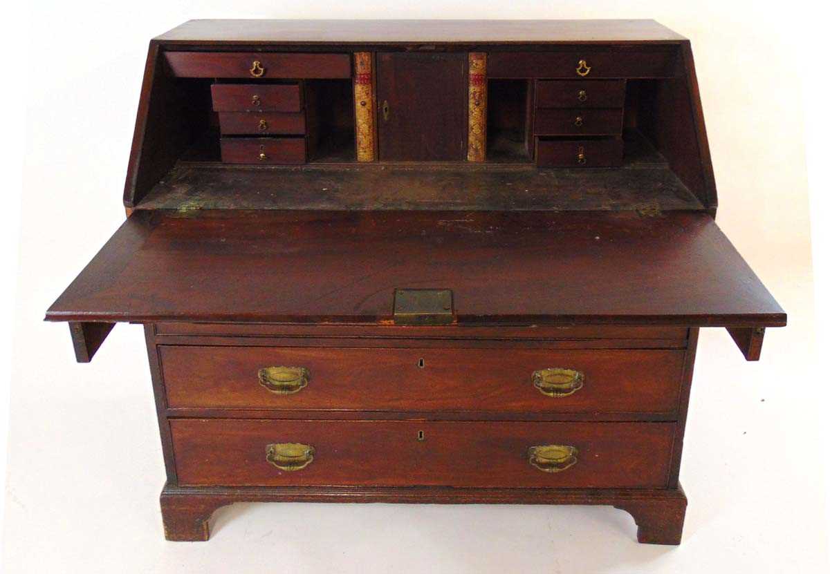 A George III mahogany bureau, the interior fitted with pigeon holes and drawers, above four oak - Image 3 of 4