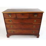 A George III mahogany chest of drawers, the top with applied moulded edge, above three short and