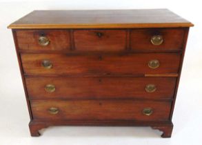 A George III mahogany chest of drawers, the top with applied moulded edge, above three short and