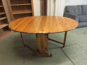 A pine gate leg dining table