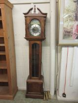 A reproduction grandfather clock by Emperor