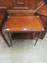 A mahogany and banded two tier occasional table on square tapering supports