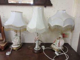 Three modern table lamps incorporating ceramic figurines of ladies No apparent damage when viewed