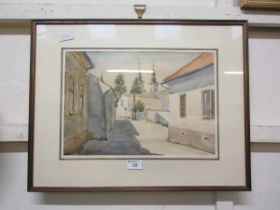 A framed and glazed watercolour of continental street scene