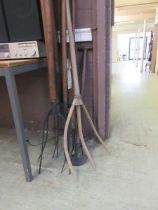 A selection of long handled pitchforks etc