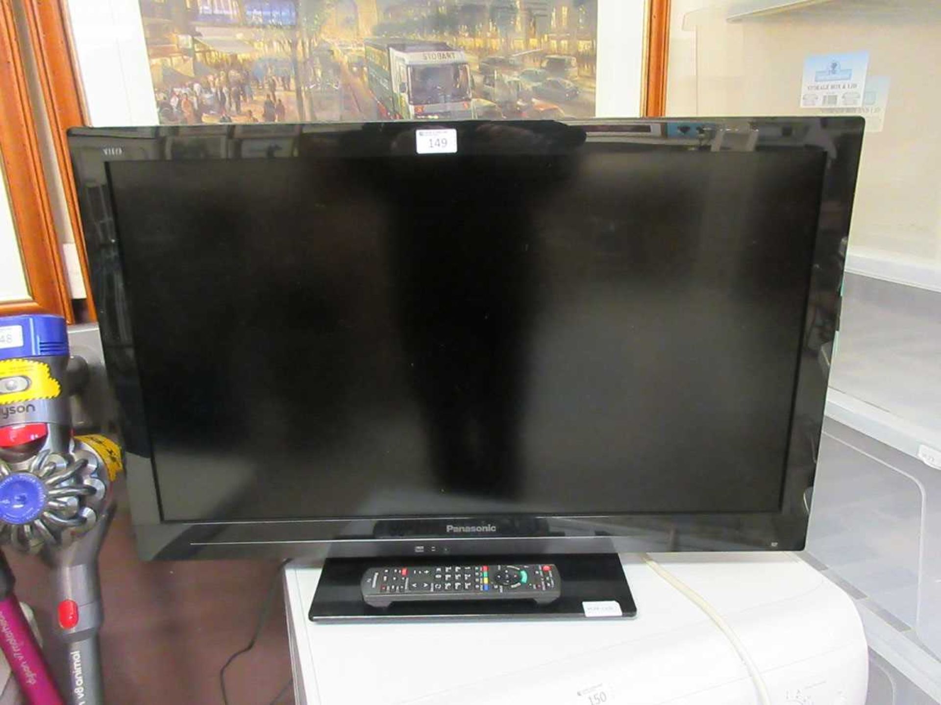 A Panasonic television, with remote