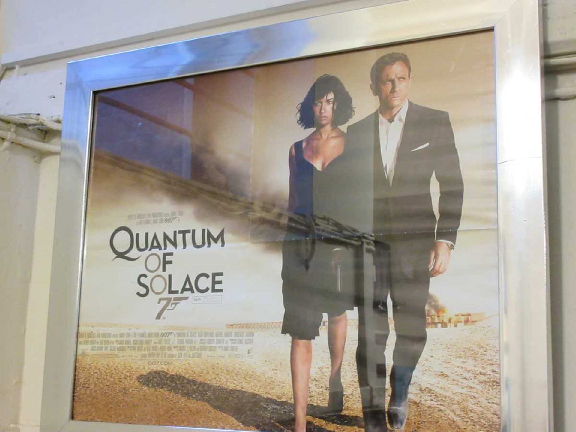 A framed and glazed 007 poster 'Quantum Of Solace'