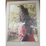 A framed and glazed limited edition print of African people, number 264/850 ,signed Combes