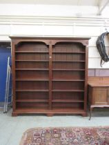 A reproduction full height mahogany bookcase Dimensions: H, 213cm, W, 208cm,D, 33cm. Shelves