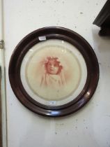 A Victorian mahogany circular framed photograph of young girl