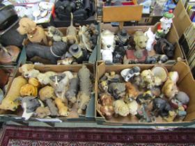 Four trays of ceramic and moulded dogs