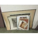 A collection of unframed prints