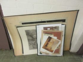 A collection of unframed prints