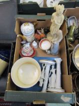 A tray containing figurines, planters, cups, saucers, etc