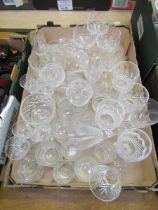 A tray of cut and other etched glass drinking vessels