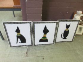 A set of three ceramic and tile edged plagues of cats