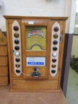 A Rotolite oak cased 1950s slot machine Unsure of functionality, unable to test due to lack of