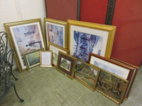 A collection of eleven various sized framed and glazed prints