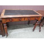A Victorian mahogany side table of two drawers on turned supports
