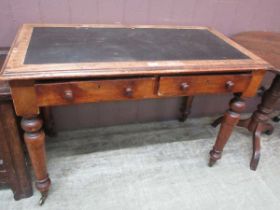 A Victorian mahogany side table of two drawers on turned supports