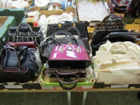 Three trays of ladies' handbags to include Radley, Kurt Geiger, Peach, etc