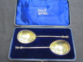 A cased set of a pair of silver hallmarked apostle spoons