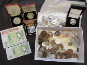 A box containing coinage, paper notes, etc