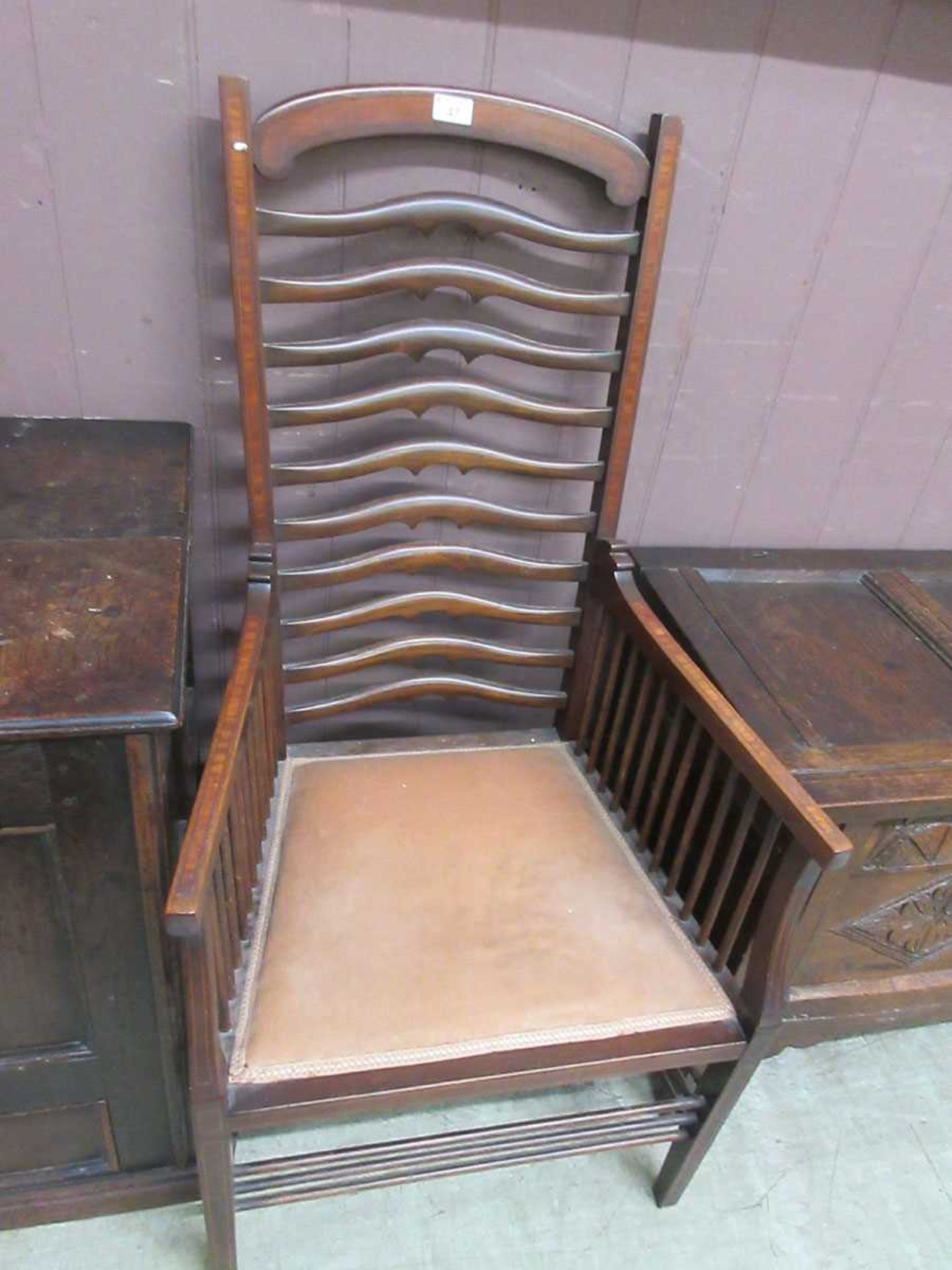 An Edwardian inlaid mahogany ladderback style armchair