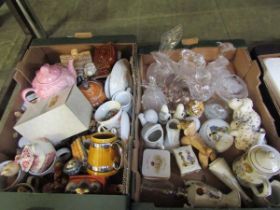 Two trays of ceramic and glassware to include animal figurines, etc
