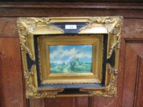 A small heavily framed print of a Dutch scene