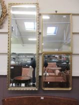 Three various gilt framed wall mirrors