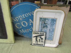 A blue enamel advertising sign 'Approved Coal Merchant' together with two other enamels and enamel
