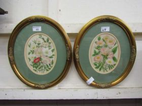 A pair of oval gilt framed and glazed possible pen and wash artworks of still life