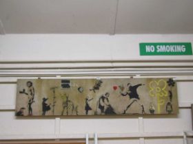 A stretched canvas compilation of Banksy works