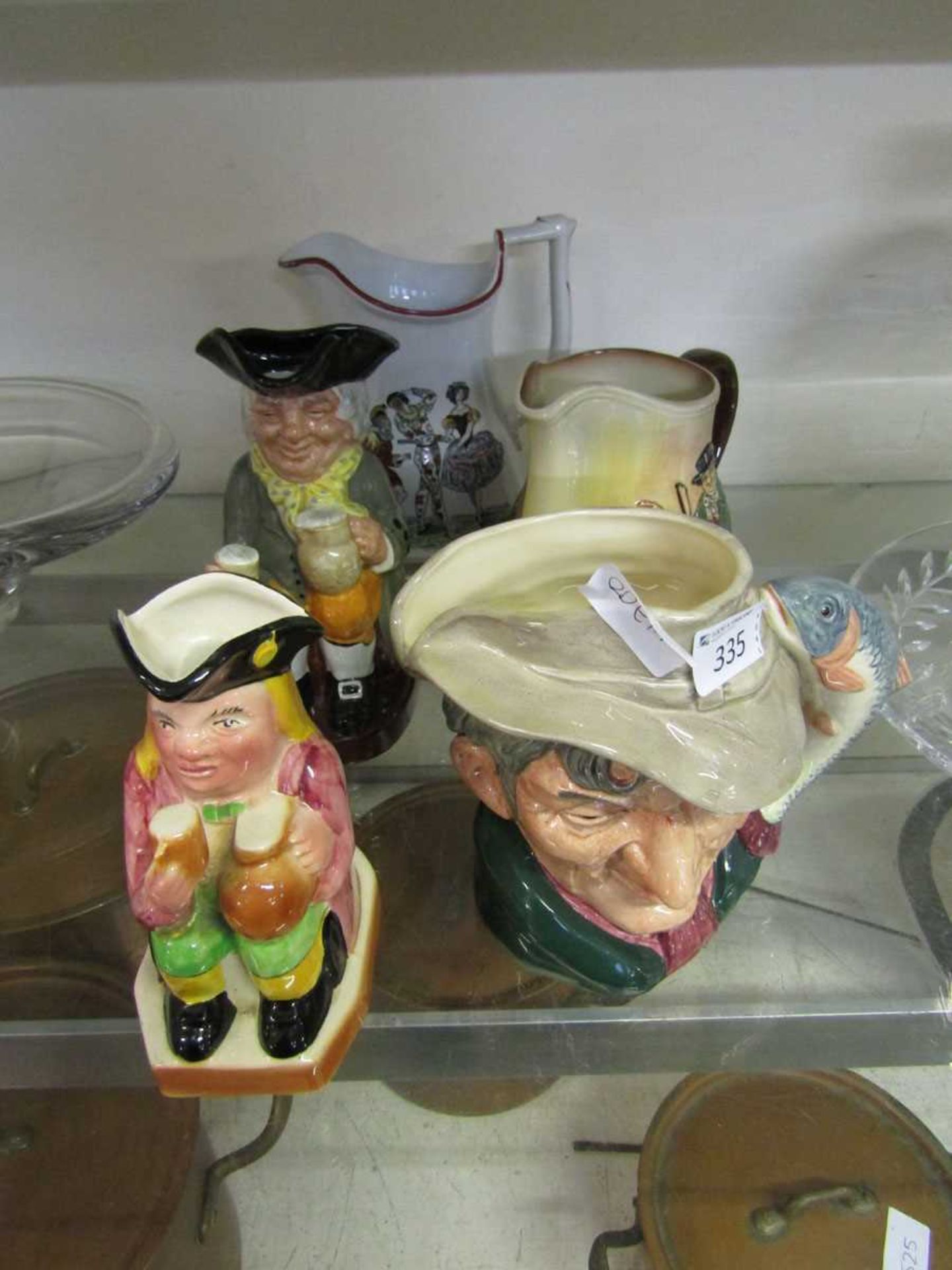 A small collection of ceramics to include Royal Doulton water jug, Royal Doulton character jug '