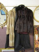Two fur coats, one by The National Fur Company