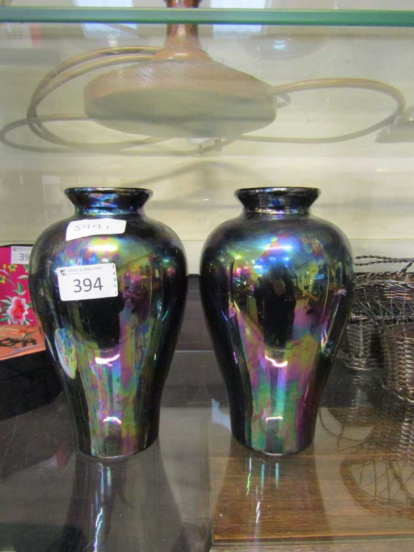 A pair of mid-20th century petrol glazed vases