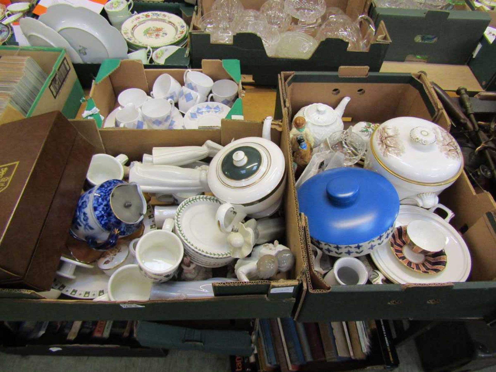 Three trays of ceramic ware to include tableware, storage jars, figurines by Nao, etc