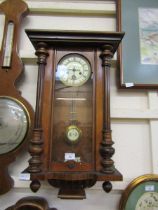 A late Victorian/early Edwardian walnut veneered drop dial Vienna wall clock