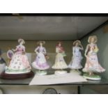 A selection of five Royal Worcester ceramic figurines consisting of 'The Graceful Arts - Painting'