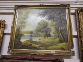 A gilt framed oil on canvas of a wooded lake scene, signed bottom left T.Tenant