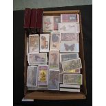 A large collection of reproduction sets of cigarette cards