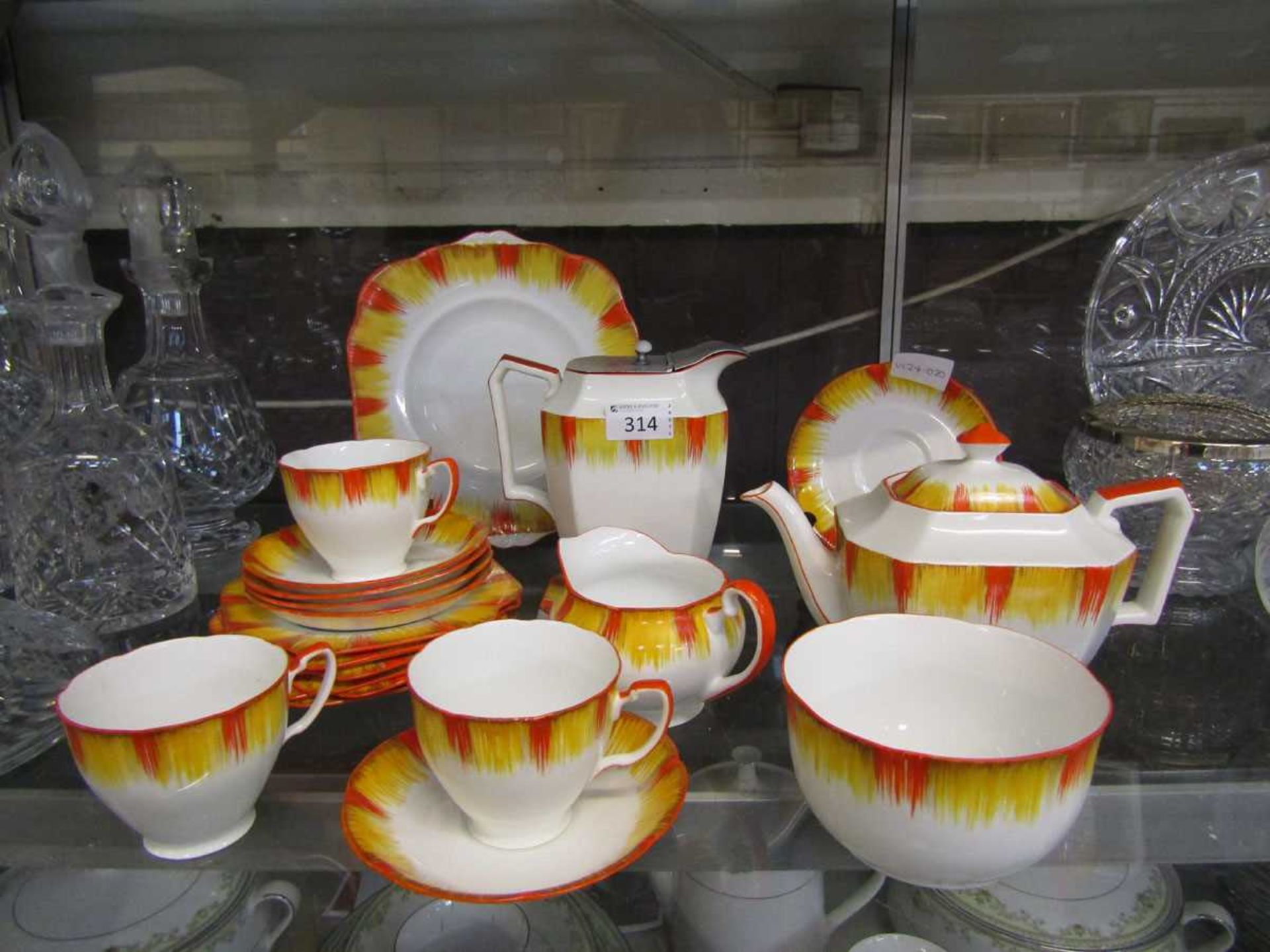 A selection of Grafton sunburst style ceramic tableware to include cups, saucers, teapot, coffee