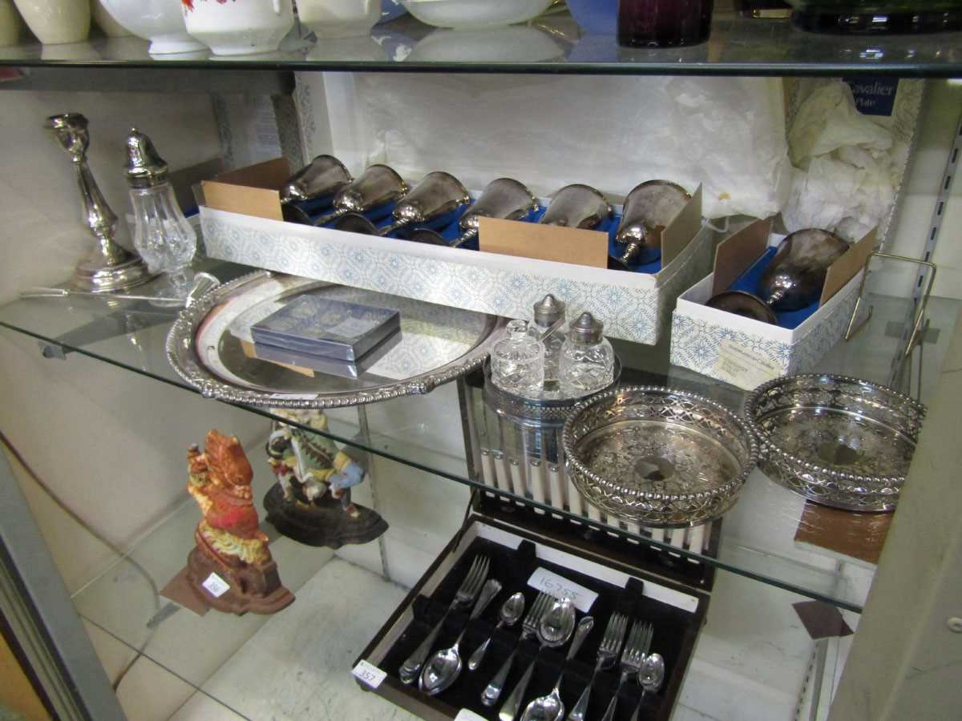 A selection of plated ware to include cased set of goblets by Cavalier, wine coasters, sugar sifter,