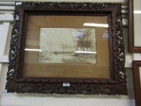 A carved oak framed and glazed watercolour of wooded river scene signed G. Unsworth