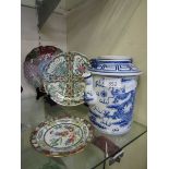 A selection of oriental style tableware to include blue and white teapot, plates, etc